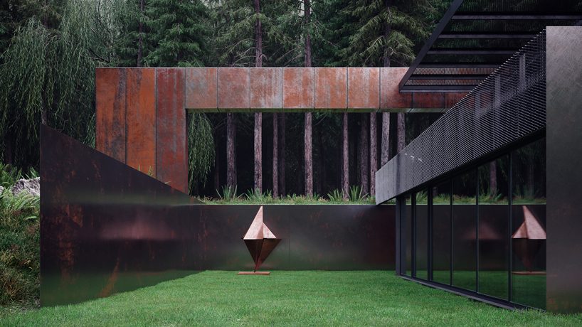 MAKHNO studio embeds corten steel house deep within ukranian forest