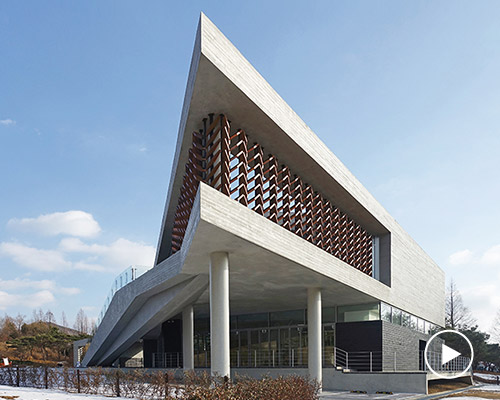 soft architecture lab's wood museum is rooted within scenic korean forest