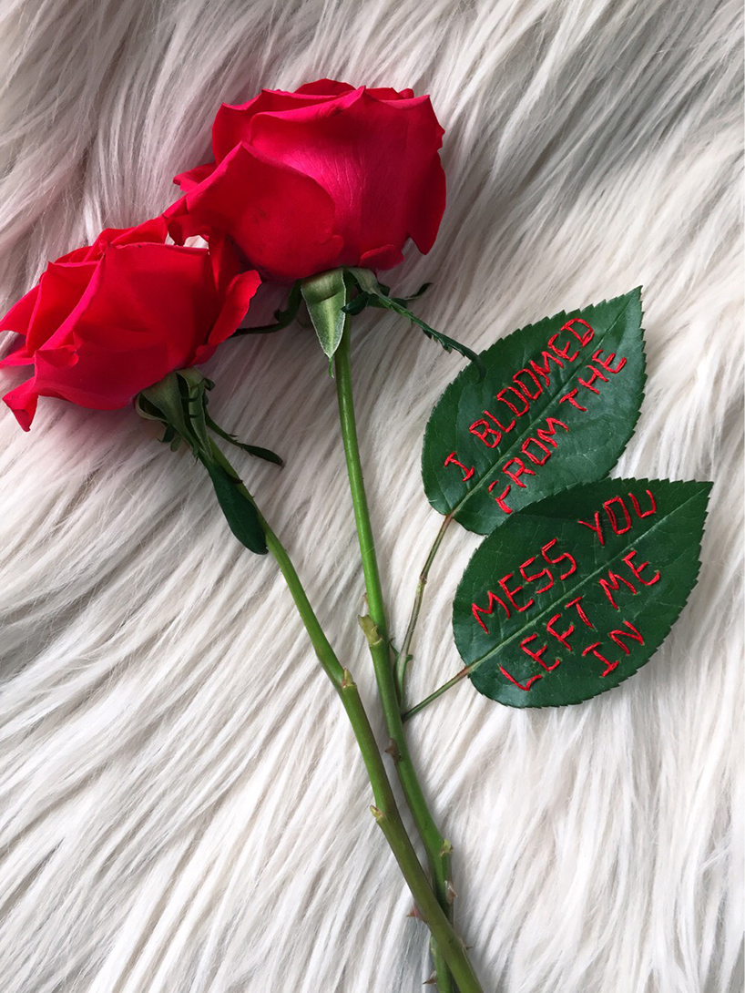 sophie king embroiders bold messages on delicate roses