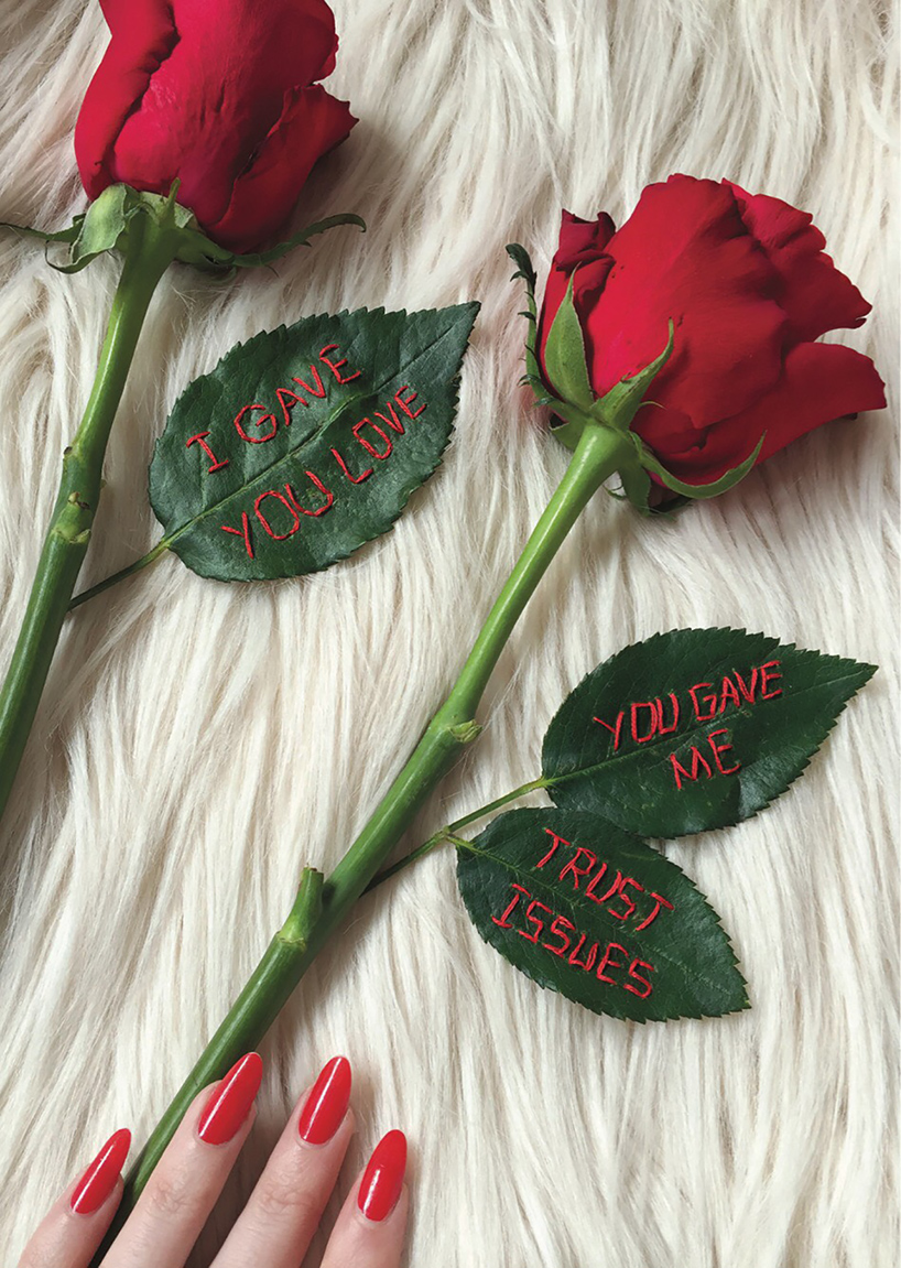 sophie king embroiders bold messages on delicate roses