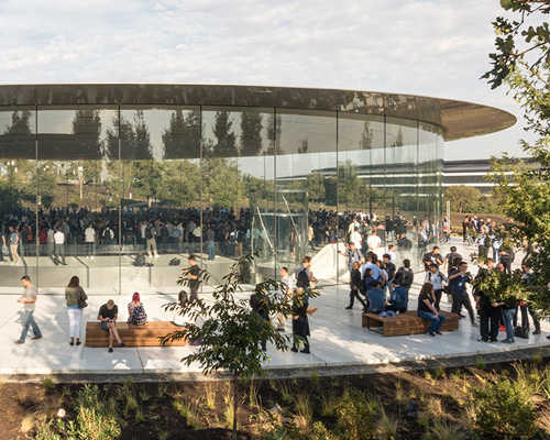 foster + partners sets world's largest carbon-fiber roof on glass cylinder for apple's theater