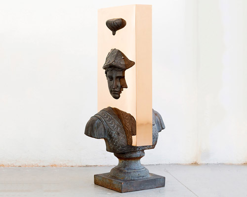 weighty bronze plates dissect vintage sculptures in studio nucleo project