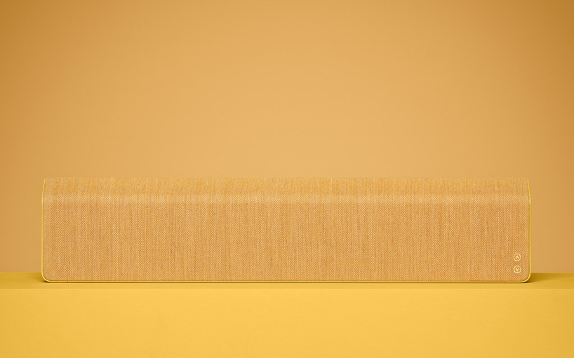 vifa's stockholm loudspeaker is wrapped in kvadrat designer textiles