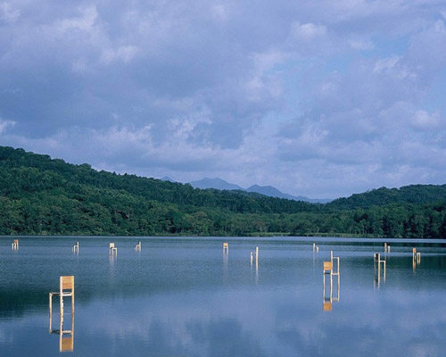 fragile chairs invade japanese lake by hidemi nishida