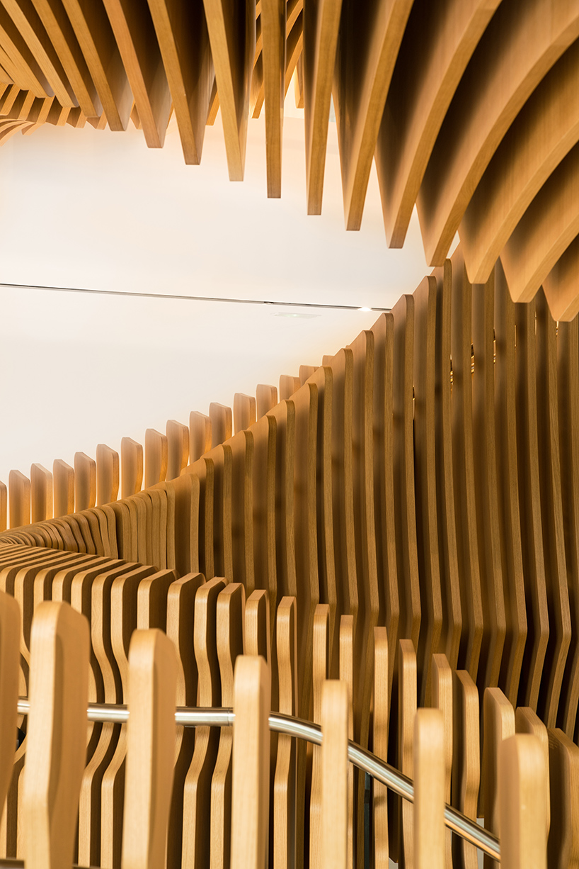 Ora Ïto uses hundreds of wooden slats for snaking stairs at LVMH offices