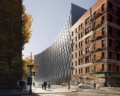 BIG's T-shaped east harlem residential building tops out in new york