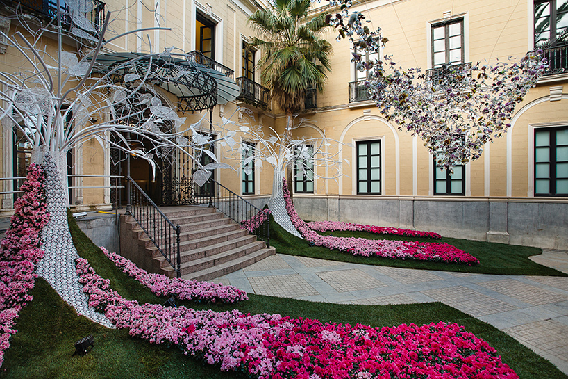 'flora' festival sees floral artists transform spanish courtyards