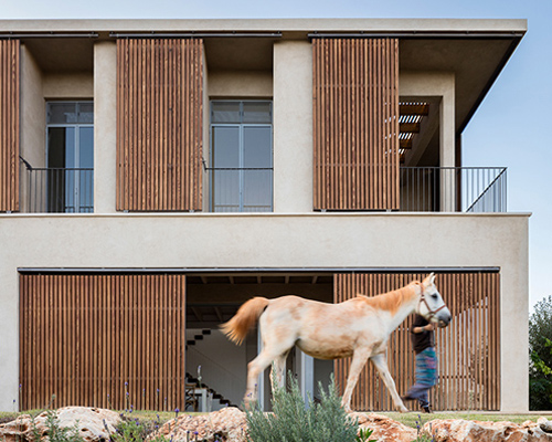 golany architects' house in galilee has an ever-changing atmosphere due to its louvres