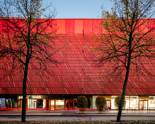 lahdelma & mahlamäki clads helsinki shopping center with undulating façade of ceramic tiles