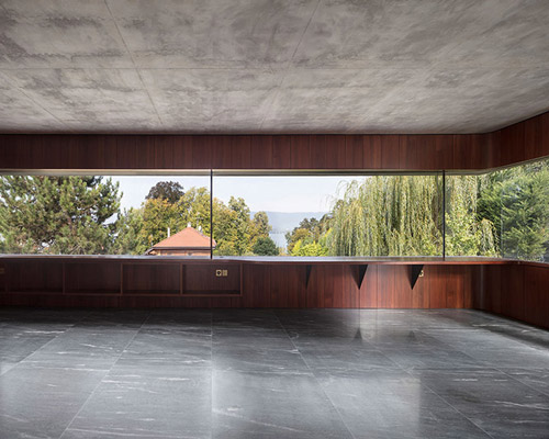 swiss cabin offers cinematic views of lake geneva through a 10 meter-wide window