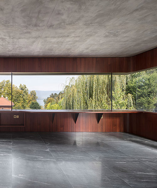 swiss cabin offers cinematic views of lake geneva through a 10 meter-wide window