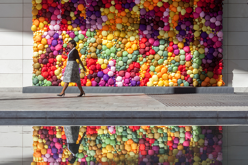 pink intruder creates vibrant mural celebrating the many colors of fruits and veggies