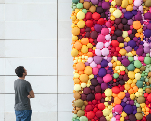 pink intruder creates vibrant mural celebrating the many colors of fruits and veggies