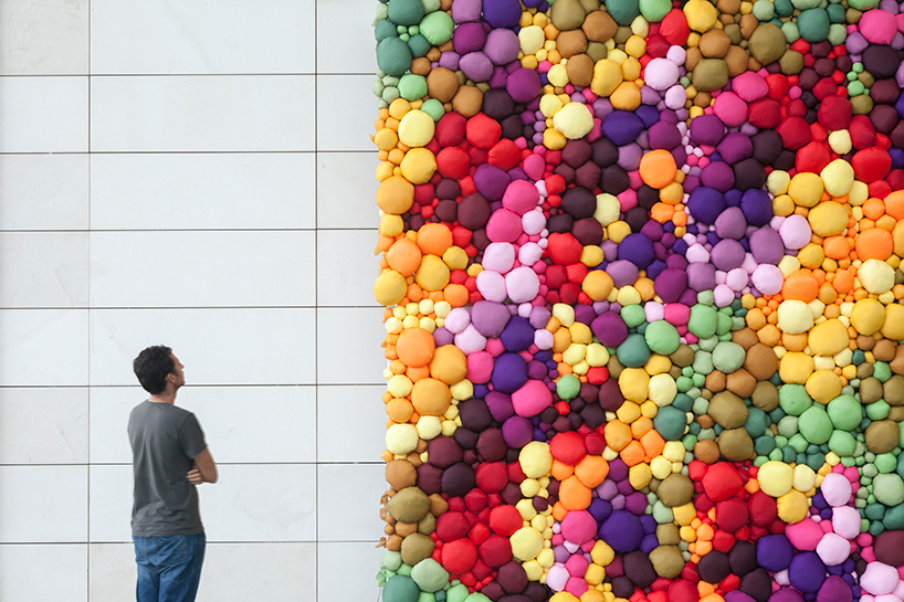pink intruder creates vibrant mural celebrating the many colors of fruits and veggies
