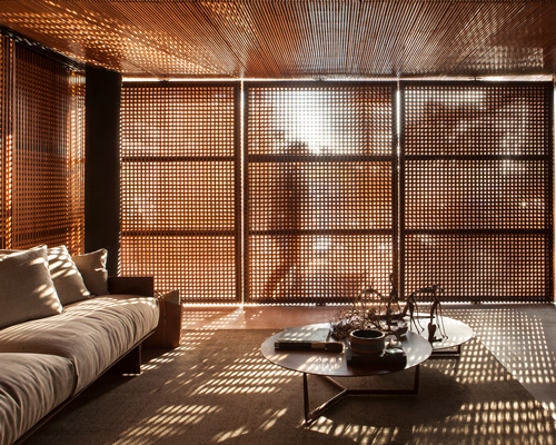 mf+arquitetos' wooden screens + garden walls establish harmony in collector's residence