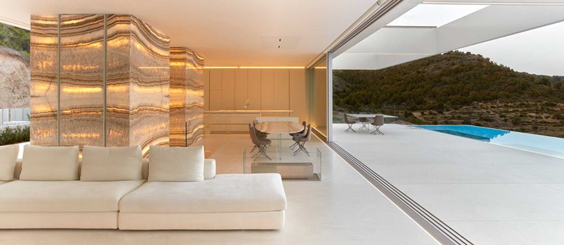 ramon esteve adorns valencian hillside house with yellow onyx stone slabs