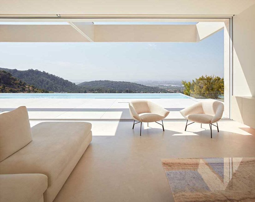 ramon esteve adorns valencian hillside house with yellow onyx stone slabs