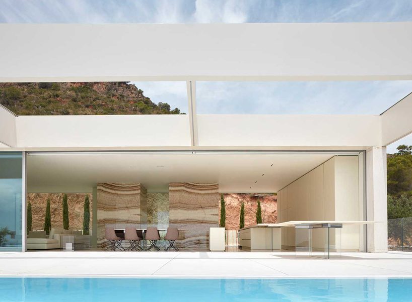 ramon esteve adorns valencian hillside house with yellow onyx stone slabs