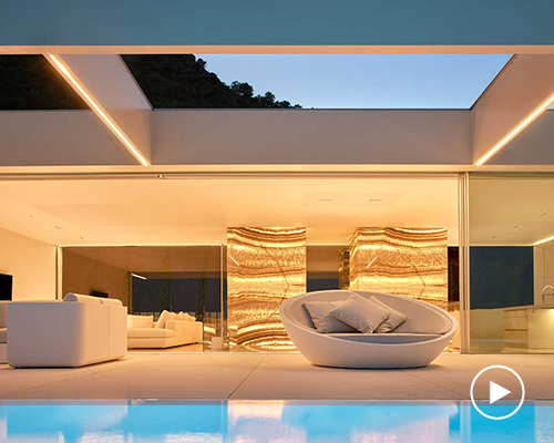 ramon esteve adorns valencian hillside house with yellow onyx stone slabs
