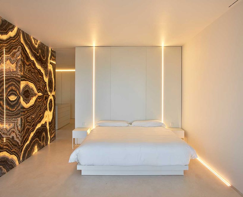 ramon esteve adorns valencian hillside house with yellow onyx stone slabs