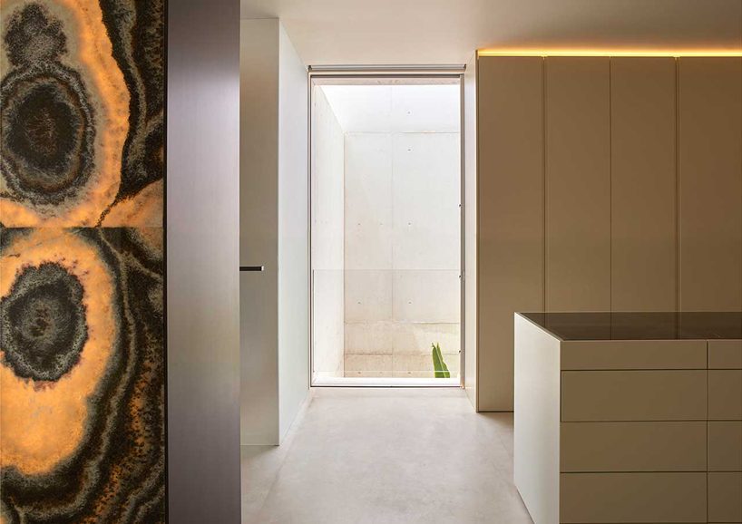 ramon esteve adorns valencian hillside house with yellow onyx stone slabs