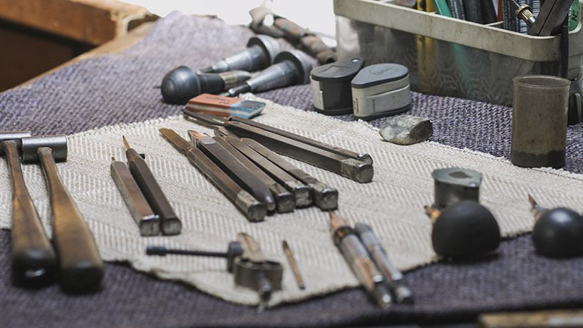 unimatic employs master decorator of guns to create unique timepieces