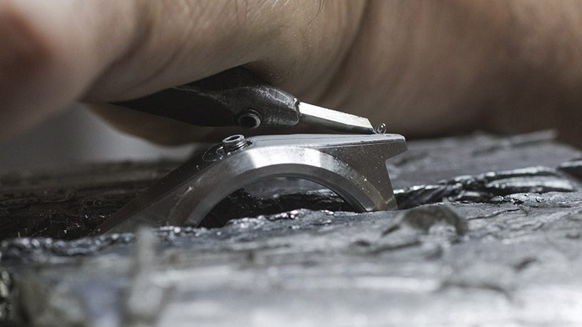 unimatic employs master decorator of guns to create unique timepieces