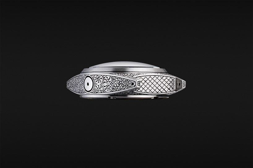 unimatic employs master decorator of guns to create unique timepieces