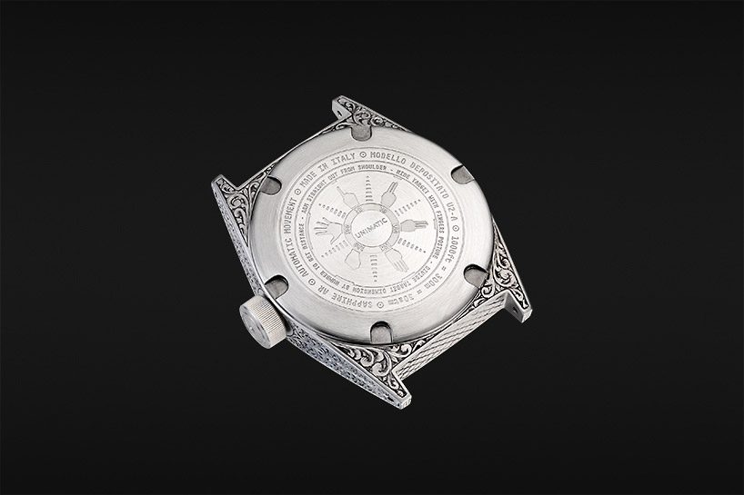 unimatic employs master decorator of guns to create unique timepieces