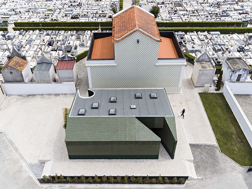 m2.senos camouflages geometric and abstract restrooms for a cemetery in portugal