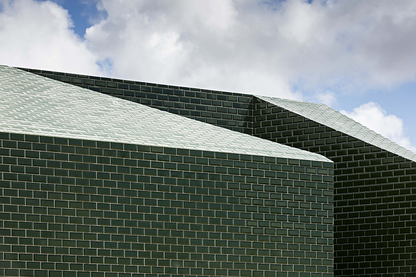 m2.senos camouflages geometric and abstract restrooms for a cemetery in portugal
