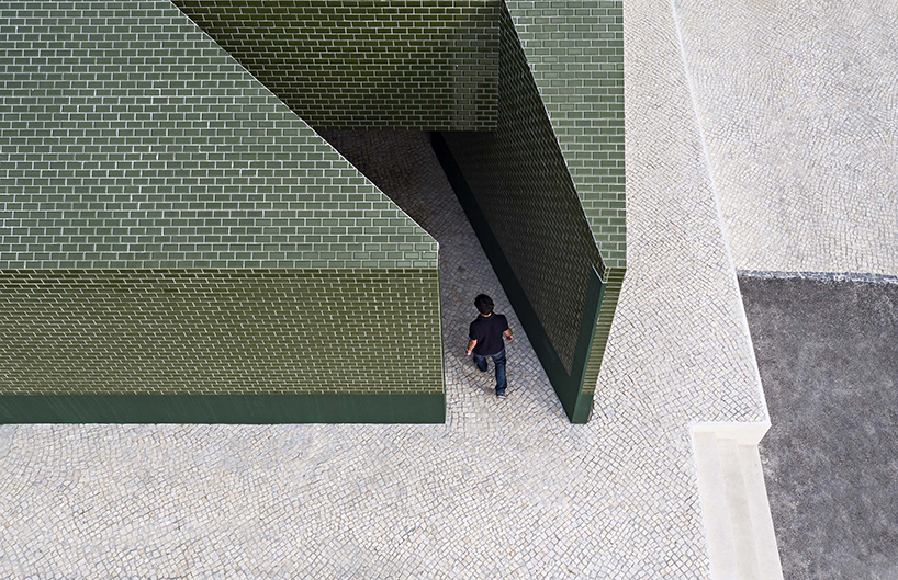 m2.senos camouflages geometric and abstract restrooms for a cemetery in portugal