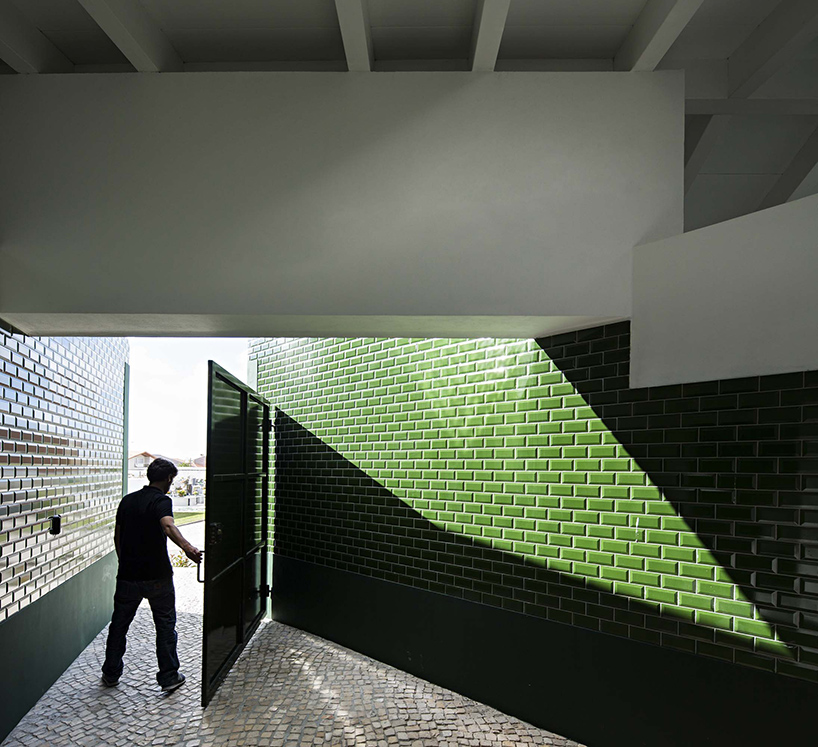 m2.senos camouflages geometric and abstract restrooms for a cemetery in portugal