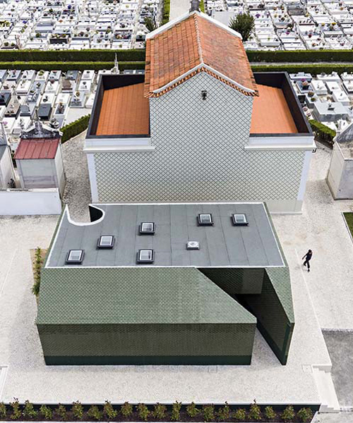 m2.senos camouflages geometric and abstract restrooms for a cemetery in portugal