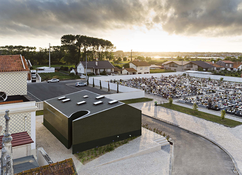 m2.senos camouflages geometric and abstract restrooms for a cemetery in portugal