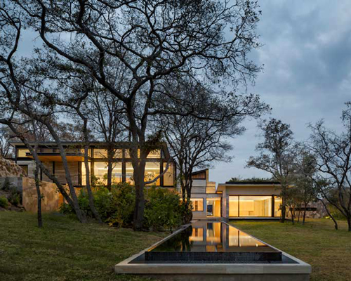 ZD+A designs a family house in mexico using local stone to create a dialogue with nature