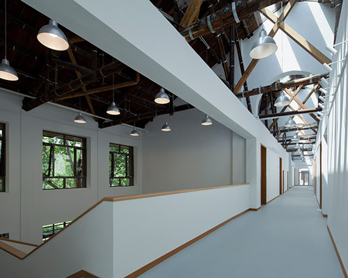 c+ architects turned old building of a university in beijing into a bright orderly public space
