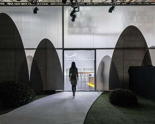 wutopia lab's community center in china links to visitors with its nature-like facade