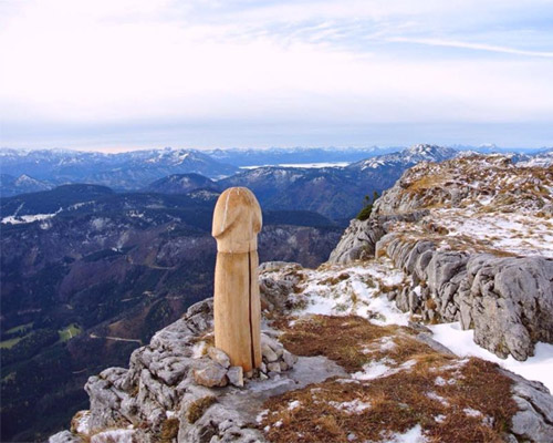 wooden penis erected atop austrian alps. the mysterious installation created big social media buzz