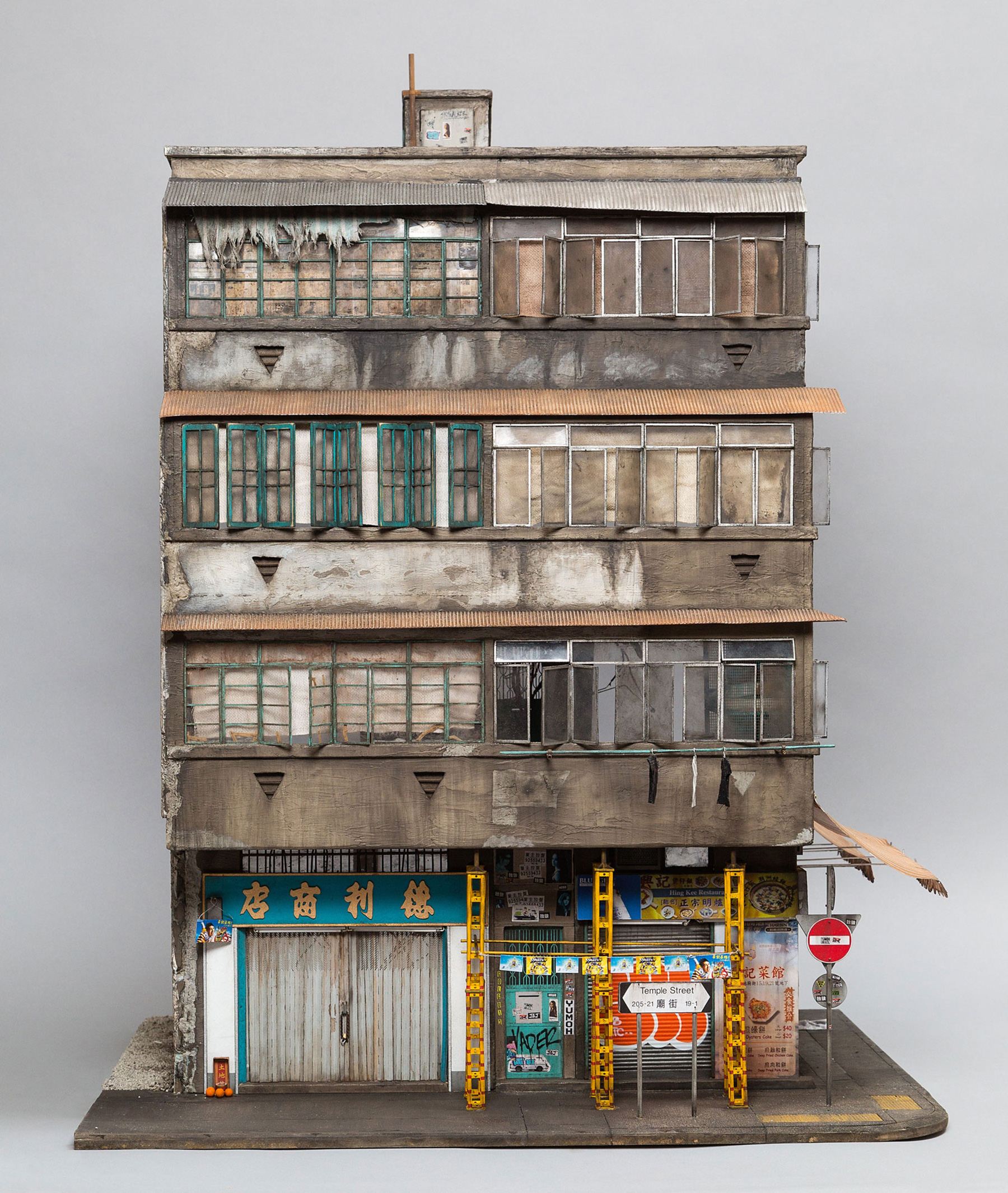 joshua smith miniaturizes hong kong urban life through tiny architectural settings