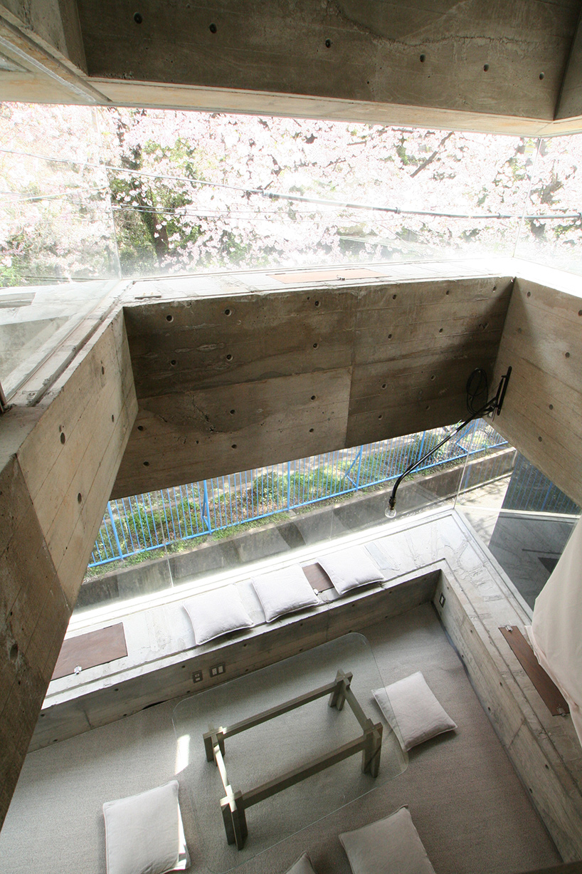 oriel window house by shinsuke fujii offers views of the neighboring cherry blossoms