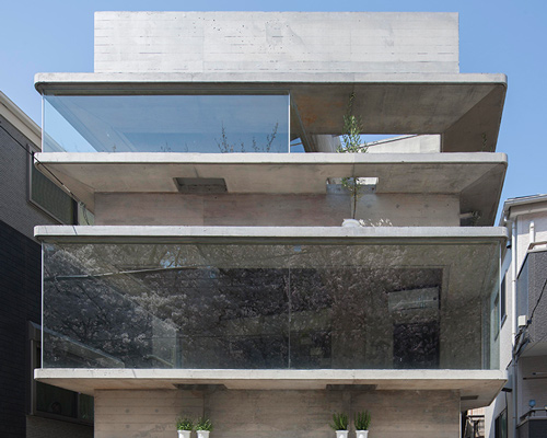 oriel window house by shinsuke fujii offers views of the neighboring cherry blossoms