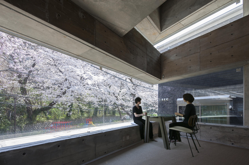 oriel window house by shinsuke fujii offers views of the neighboring cherry blossoms