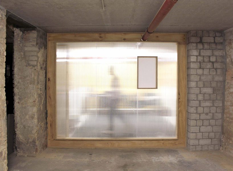 the kardamov studio in berlin is conceived within an empty basement by so + so studio