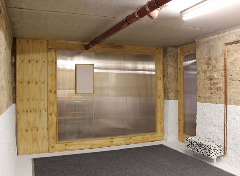 the kardamov studio in berlin is conceived within an empty basement by so + so studio