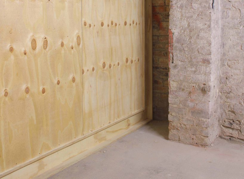 the kardamov studio in berlin is conceived within an empty basement by so + so studio