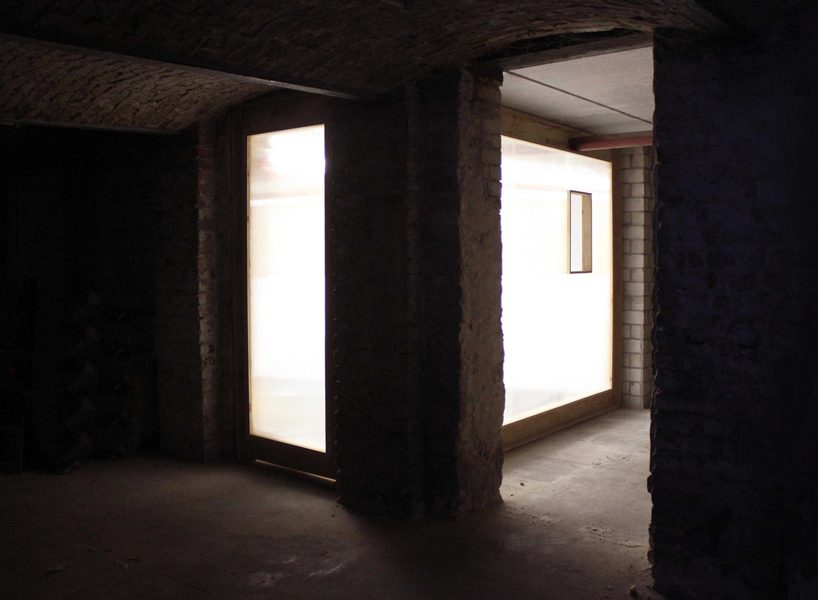 the kardamov studio in berlin is conceived within an empty basement by so + so studio