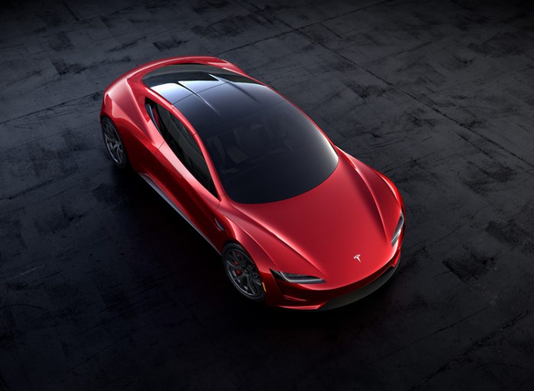 tesla roadster electric supercar races to a top speed over 