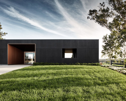 THOSE architects convert former dairy farm into contemporary sales office