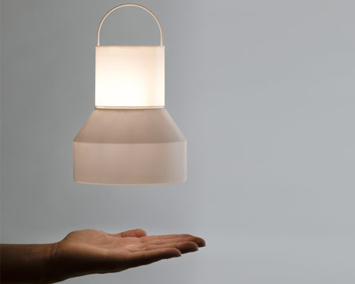 fabien roy's rocket nozzle-shaped lamp hovers right above you